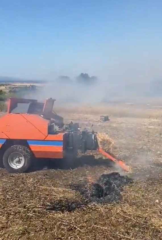 Tarım arazisinde başlayıp ormana sıçrayan yangının saman balya makinesinden çıkmış